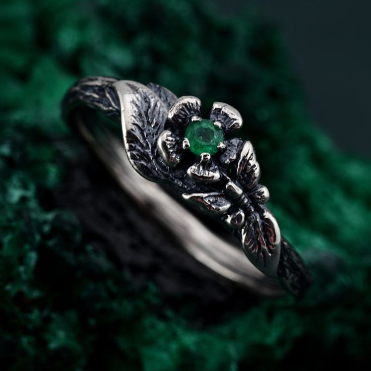 🌟 Warm Greetings, Jewelry Enthusiasts! 🌟 Step into a world where elegance meets personalization with our handcrafted silver rings. Each piece is a testament to unique artistry, blending mystical charm with modern finesse. Our collection offers a special touch for those who adore distinctive and thoughtfully designed jewelry. 🌈 Customization at Your Fingertips: Choose your perfect ring size and select from a variety of enchanting gemstones using our user-friendly dropdown menus. We delight in offering you the chance to create a ring that resonates with your personal style and story. ✨ Design It Your Way: Dreaming of a specific look? We're here to make it happen! Whether it's altering dimensions, adding extra gemstones, or choosing a different material, reach out to us. Your imagination i Fine Jewelry Flower Ring For May Birthstone, Handmade Sterling Silver Engraved Ring For Promise, Elegant Engraved Green Rings, Elegant Engraved Round Emerald Ring, Elegant Green Engraved Rings, Elegant Hand Forged Engraved Ring For Anniversary, Elegant Hand-forged Engraved Ring For Anniversary, Elegant Promise Flower Ring With Birthstone, Fine Jewelry Sterling Silver Flower Ring With Birthstone