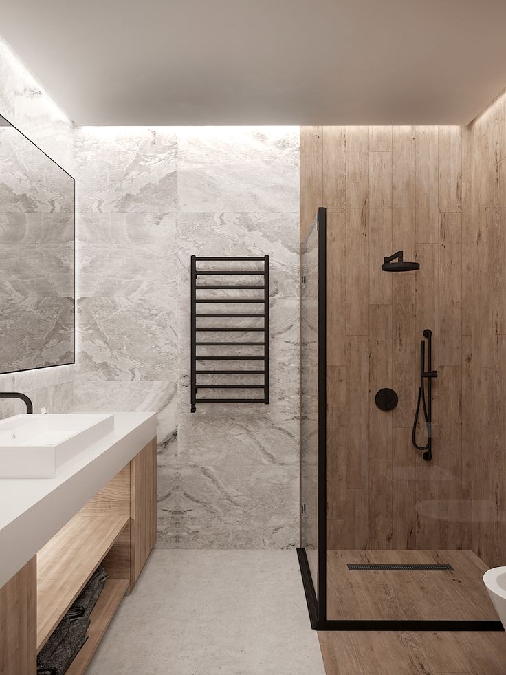 a modern bathroom with marble walls and floor