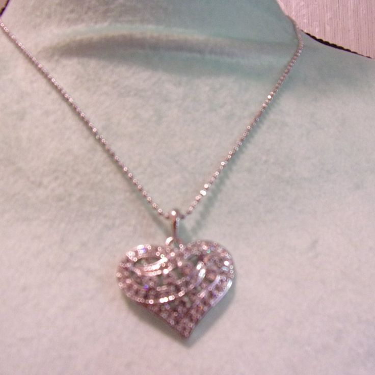 Nwt: Pretty Silver Tone Small Heart Necklace With Solid Clear Rhinestone In It, It Is 1" Across 1" High, It Is On A 18" Small Ball Chain Silver Heart Pendant Rhinestone Necklace For Party, Gift Rhinestone Crystal Necklace With Sparkling Stones, Gift Crystal Rhinestone Necklace With Sparkling Stones, Elegant Rhinestone Heart Pendant Necklace For Party, Sparkling Crystal Rhinestone Necklace Gift, Diamond White Rhinestone Necklace Gift, Elegant Heart Pendant Jewelry With Bling, Diamond White Rhinestone Necklace As Gift, Elegant Bling Heart Pendant Jewelry