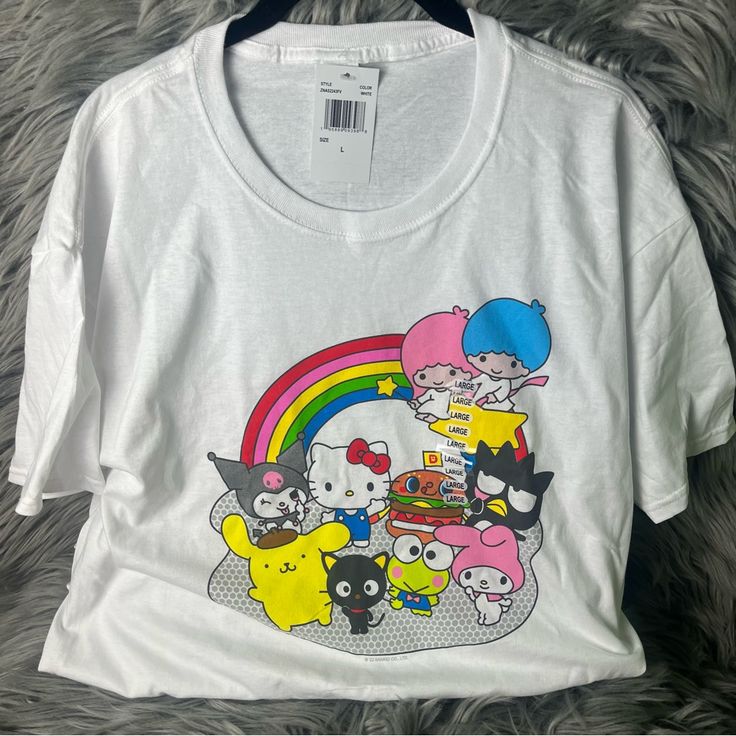 Brand New With Tags Smoke And Pet Free Home Sanrio Shirt With All The Characters: Kuromi, My Melody, My Little Twin Stars, Hello Kitty, Badzmaru, Pompompurin, Keroppi, Hamburger I Have Multiple Sizes Available! Please Check Out My Other Listings To Save On Shipping! Feel Free To Ask Questions And Make Reasonable Offers Through The “Make An Offer Button” Playful Hello Kitty T-shirt For Summer, Fun Hello Kitty Short Sleeve Tops, Cotton Hello Kitty Fun Tops, Multicolor Hello Kitty Print Short Sleeve Tops, Multicolor Kawaii T-shirt For Spring, Fun Cotton Tops With Hello Kitty, Multicolor Kawaii Tops With Letter Print, Kawaii Hello Kitty Print Crew Neck Top, Fun Hello Kitty Print Summer T-shirt