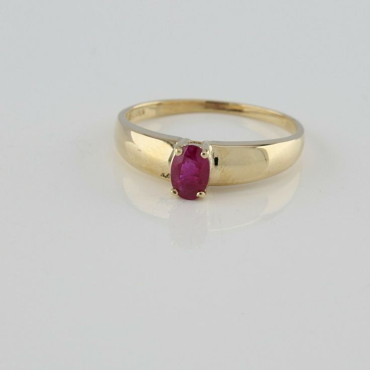 10K Yellow Gold 1/2ct + Ruby Ring, oval 5.8 x 4mm faceted red stone dome top, Ring size 7 3/4, Circa 1960, 1.94 grams SKU# BB280R07 This listing contains photographs of the actual item you will receive. Our items are in excellent condition with little or no signs of wear and many are one of a kind pre-owned estate finds. Please look closely at the pictures in this listing as they are part of the product description. Please read the description, as any imperfections or condition comments will be Classic Sapphire Ring Oval Cabochon, Classic Oval Sapphire Ring, Classic Ruby Ring With Polished Round Stone, Classic Oval Solitaire Signet Ring, Classic 14k Gold Sapphire Oval Cabochon Ring, Formal Oval Cabochon Ruby Ring With Polished Finish, Oval Gemstone Dome Ring In Yellow Gold, Formal Domed Gemstone Rings, Classic Red Ruby Ring With Round Band