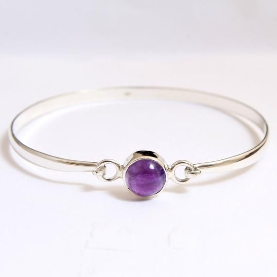 Purple Amethyst Round Shape Gemstone Bangle Bracelet  - 925 Sterling Silver Handmade Women Designer Bracelet Jewelry length 7.5" - ab0327MATERIAL - 925 STERLING  SILVERBRACELET SIZE-  7.5"  STONE - Amethyst STONE SHAPE - RoundSTONE SIZE  - 9 X 9 MMBRACELET WEIGHT - 8 GRAMS Gemstone Bangle Bracelets, Amethyst Bangle, Designer Bracelet, The Bangles, Bracelets Design, Gemstone Bangle, Stone Bangle, Handmade Bangles, Amethyst Bracelet