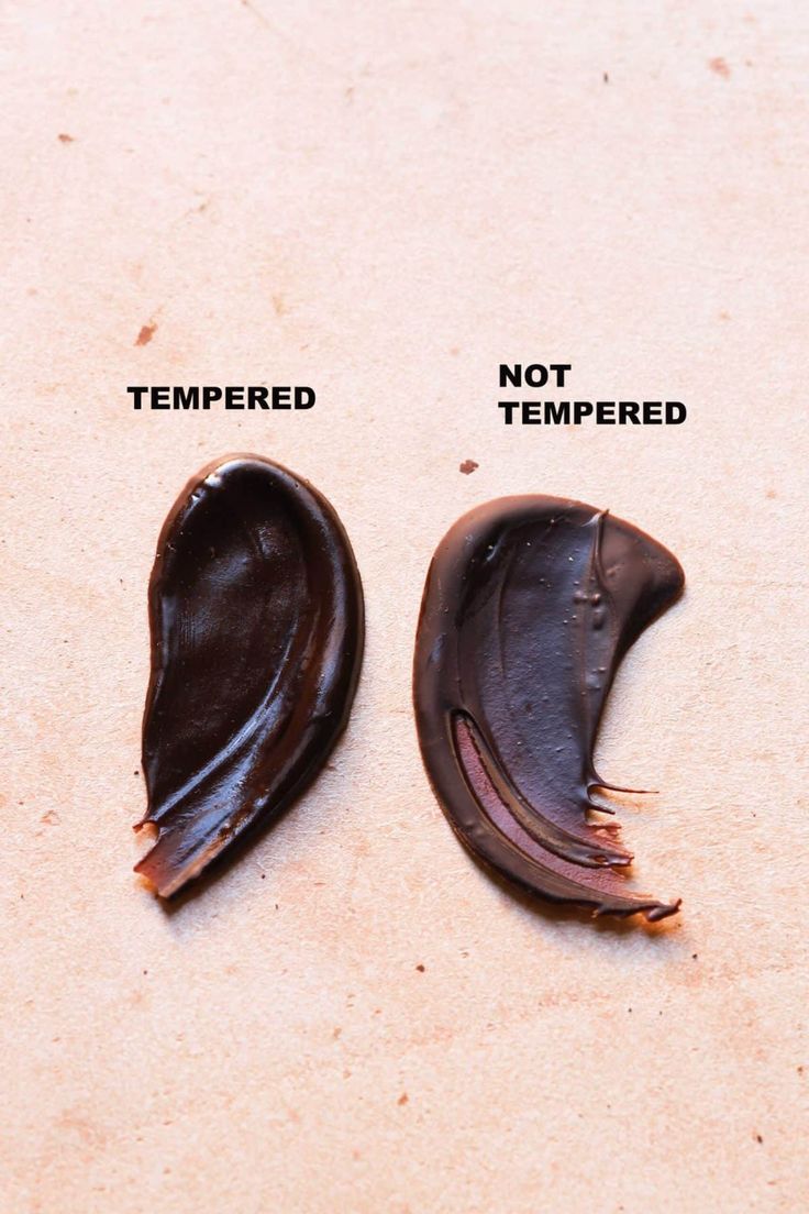 two pieces of chocolate that have been cut in half to look like an eggplant