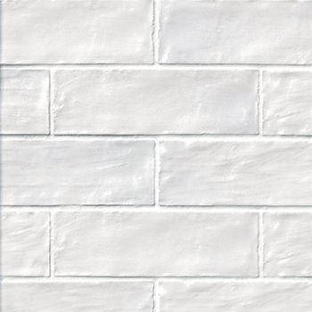 a white brick wall is shown in this image