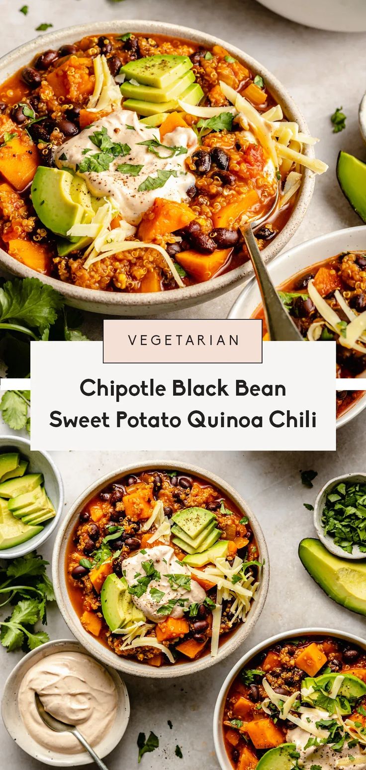 two bowls filled with black bean sweet potato quinoa chili and topped with avocado