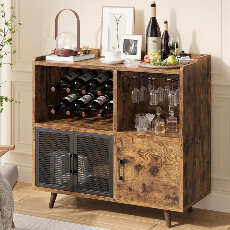 a wooden cabinet with wine bottles and glasses