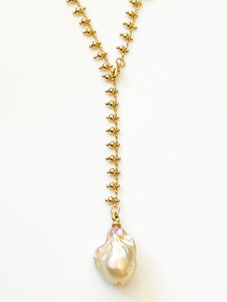 Peach Japanese Keshi Pearl Necklace on Gold Ball Charm Chain by Sage Machado - The Sage Lifestyle Ceremonial Gold Pearl Chain Jewelry, Spiritual Pendant Necklace With Pearl Chain, Peach Pearl Necklace, Gold-tone Pearl Necklace With Adjustable Chain, 14k Yellow Gold-filled Pearl Necklace With Adjustable Chain, Keshi Pearl Necklace, Keshi Pearls, Necklace Designs, Chain Lengths