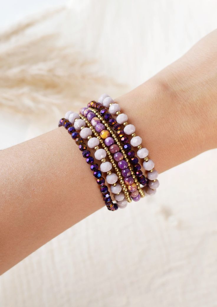 This gorgeous handmade bracelet is made by multi strand beaded in shade of purple color combination  So it's very comfortable to wear and perfect for everyday look. and it will be a good gift for friends or bridal party gifts   >>Dimension<<   Length:  Size 20 cm Width: 2.5cm Weight: about 10 grams *If you are not sure about size please feel free to contact me I would be happy to help Multi-strand Wrap Bracelet With Faceted Beads, Adjustable Hand Wrapped Purple Bracelets, Adjustable Hand-wrapped Purple Beaded Bracelet, Hand Wrapped Purple Bracelets, Hand Wrapped Purple Bracelets As Gift, Lavender Beaded Bohemian Crystal Bracelet, Purple Hand-strung Bohemian Bracelet, Lavender Beaded Bracelets With Round Beads As Gift, Bohemian Purple Stretch Bracelet With Faceted Beads