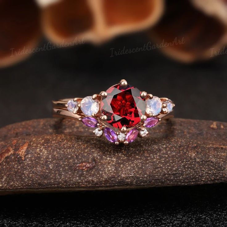 Unique Round Garnet Engagement Ring Set Vintage Moonstone - Etsy Lab-created Ruby Round Cut Wedding Ring, Lab-created Ruby Round Cut Ring For Wedding, Lab-created Ruby Wedding Ring With Round Cut, Wedding Lab-created Ruby Round Cut Ring, Red Ruby Birthstone Ring With Gemstone Accents, Purple Ruby Ring With Center Stone For Wedding, Wedding Ruby Jewelry With Accent Stones, Lab-created Ruby Wedding Ring With Round Shape, Multi-stone Round Ruby Ring