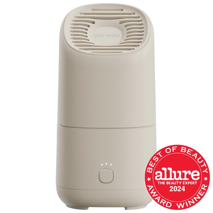 A portable humidifier to reap the wellness benefits of increased indoor humidity anywhere, any time.Highlighted Features:- Skin Health On The Go: Take the Canopy Portable Humidifier with you inside and outside of the home (bedroom, desk, car, office).- Dermatologist Recommended: Dermatologist recommended for healthy, hydrated skin.- Built-In Aroma Diffusion: Evaporative, clean aroma diffusion for a clean scenting experience.What Else You Need to Know: Avoid letting an on-the-go lifestyle disrupt Shop Canopy, Portable Humidifier, Bedroom Desk, Hydrated Skin, Skin Hydration, Car Office, Hydrating Cream, Dermatologist Recommended, Beauty Awards