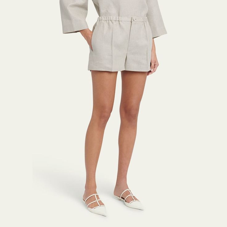 Valentino Garavani tailored linen shorts features an elastic waist Mid-rise  Pleated front  Button fly Side slip pockets; back welt pockets  Relaxed legs  Flax linen  Made in Italy Chic Linen Shorts With Relaxed Fit, Classic Linen Bottoms For Daywear, Chic Relaxed Fit Linen Shorts, Spring Linen Shorts With Pockets, Linen Shorts With Welt Pockets For Work, Linen Workwear Shorts With Welt Pockets, Classic Linen Shorts, Beige Linen Bermuda Bottoms, Linen Bermuda Shorts With Elastic Waistband