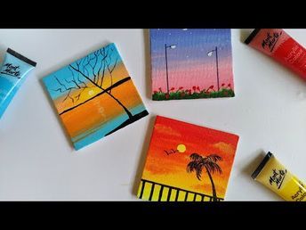 four small paintings with different colors and designs are on the table next to each other