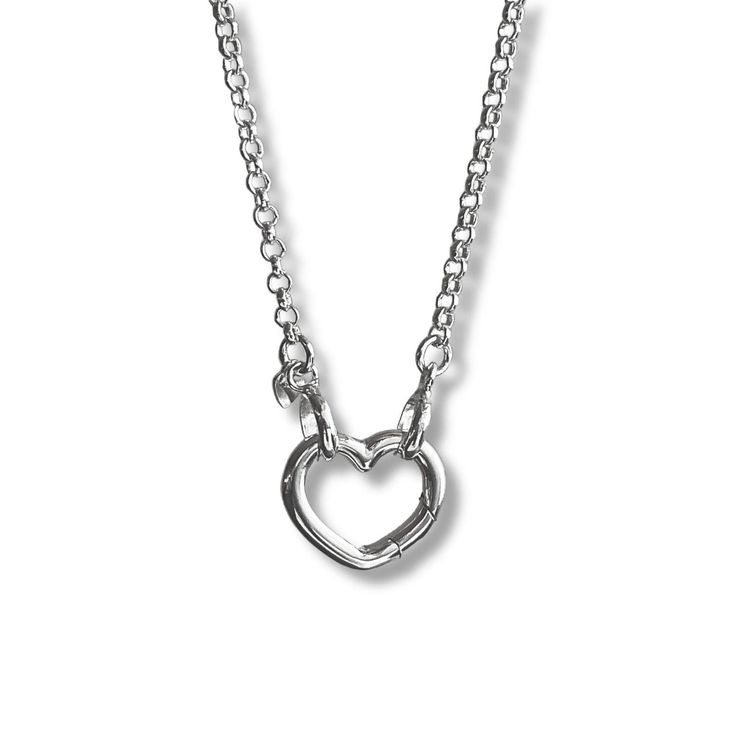 Reach for the timelessness of this sterling silver rolo chain necklace with a unique open heart front closing clasp. This necklace is made of sterling silver and is a perfect balance of modern charm and classic style Details: Chain: Solid Sterling Silver rolo chain, 2.4mm  Clasp: Solid sterling silver self-closing heart push clasp, sterling silver, 15mm heart. Length options: 15" to 28" Shipping:   Complimentary shipping in the USA Ready to ship within one business day Complimentary gift wrap All items from my shop:  https://www.etsy.com/shop/LagunaLifeDesigns Silver Heart Pendant Chain Necklace With Adjustable Chain, Minimalist Silver Chain Necklace With Heart Pendant, Minimalist Silver Heart Pendant Chain Necklace, Silver Heart-shaped Cable Chain Necklace, Silver Open Heart Chain Necklace With Charm, Silver Open Heart Necklace With Adjustable Chain, Silver Open Heart Chain Necklace, Silver Heart Charm Chain Necklace With Heart Pendant, Silver Heart-shaped Jewelry With Cable Chain