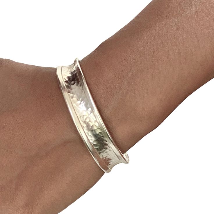 ❋ Handmade Sterling Silver Cuff Bracelet, Hammered Shiny Silver, a little Concave and Framed edges  ❋ Width: 1/2 inches (13mm)  ❋ Size: Cuff's Length (end to end) -  6 1/2 inches / 16.5cm ❋ Metal Purity: 95% Pure Silver (Purer than sterling Silver - 92.5%) 5/16 inches Wide: https://www.etsy.com/listing/873886505/ Wider versions: https://www.etsy.com/listing/250878986 https://www.etsy.com/listing/173665269 Matching style Cuff Rings: https://www.etsy.com/listing/176672865 https://www.etsy.com/list Adjustable Hammered Cuff Bangle, Adjustable Hammered Cuff Bracelet, Minimalist Adjustable Hammered Cuff Bracelet, Adjustable Minimalist Sterling Silver Cuff Bracelet, Adjustable Open Band Bangle As A Gift, Adjustable Hammered Everyday Bracelets, Adjustable Hammered Sterling Silver Minimalist Bracelet, Adjustable Open Band Bangle, Adjustable Hammered Sterling Silver Bangle