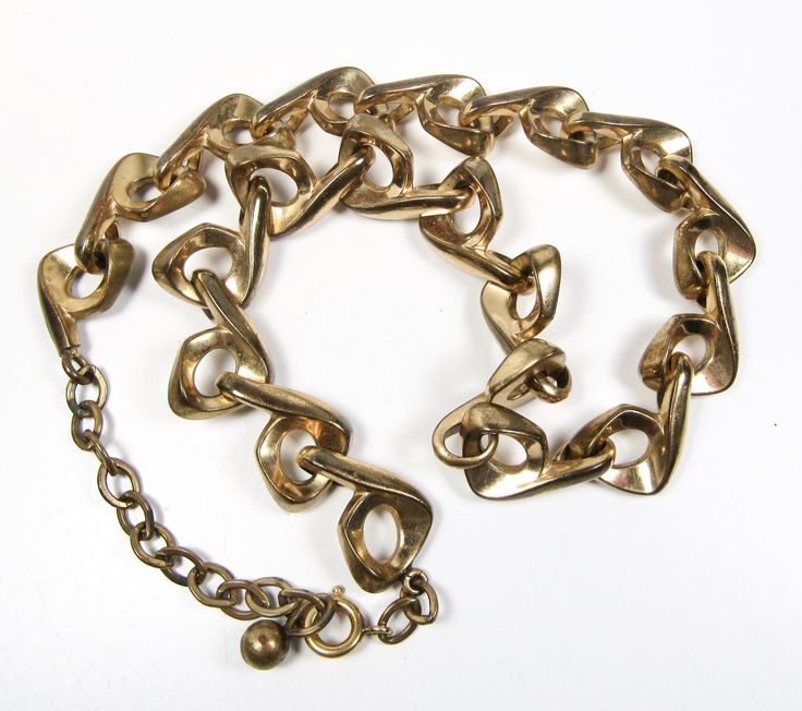 "Chunky Gold Tone Machine Age Necklace Vintage Costume 18\" 1940s Era Art Deco Avant garde chunky panel link design necklace. May require cleaning/polishing. The necklace is well made and measures 18\". Weight 85 grams Condition: Shows tarnish & wear - original clasp appears to have been replace by a gold filled spring ring Is still adjustable to smaller than 18\" Please see all photos and check our other listings. Thank you!" Vintage Formal Chain Necklace With Chunky Chain, Vintage Formal Chunky Chain Necklace, Vintage Metal Jewelry With Chunky Chain, Formal Vintage Chunky Chain Necklace, Vintage Style Chunky Link Chain Necklace, Vintage Oval Link Chunky Chain Necklace, Vintage Chunky Chain Jewelry With Oval Links, Vintage Chunky Oval Link Chain Necklace, Vintage Chunky Gold Necklace