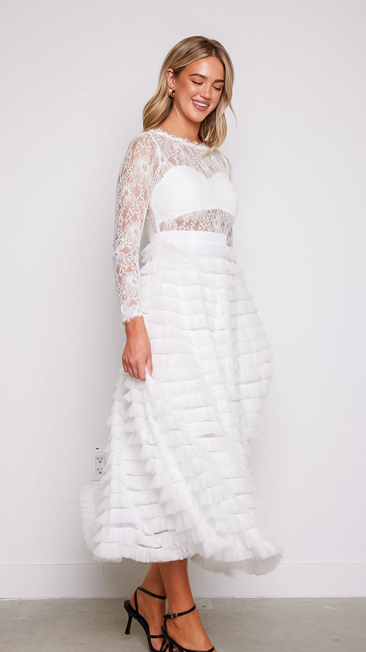 Experience the magic and allure of our Olivia Layered White Lace Tulle Dress, where timeless elegance meets modern romance. Whether you're walking down the aisle, attending a formal event, or celebrating a special occasion, this dress will make you feel like the epitome of grace and beauty. 78747 D8-2 Spring Fitted Organza Ball Gown, Fitted Tulle Bridesmaid Dress For Evening, Spring Organza Ball Gown Fitted, Elegant Tulle Maxi Dress For Wedding, Formal Tulle Dress With Voluminous Skirt, Bridesmaid Dresses With Sheer Bodice In Ball Gown Shape, Fitted Illusion Neckline Dress For Bridesmaids, Bridesmaid Dress With Sheer Bodice Ball Gown, Fitted Illusion Neckline Bridesmaid Dress