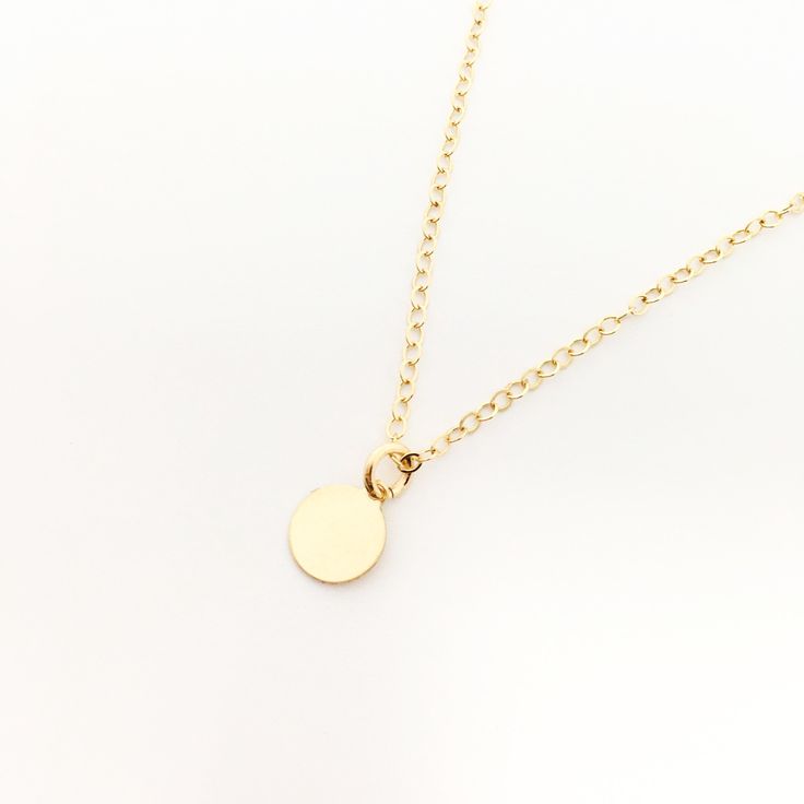 Elena Disc Charm Necklaces | Gold - MTT Collective Flat Heel Boots, Cut Clothes, Necklaces Gold, Beanie Style, Sneaker Slippers, Gold Charm Necklace, Heel Slippers, Charm Necklaces, Backpacking Packing