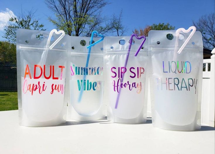 three plastic cups with straws in them and the words, adult sip sip therapy