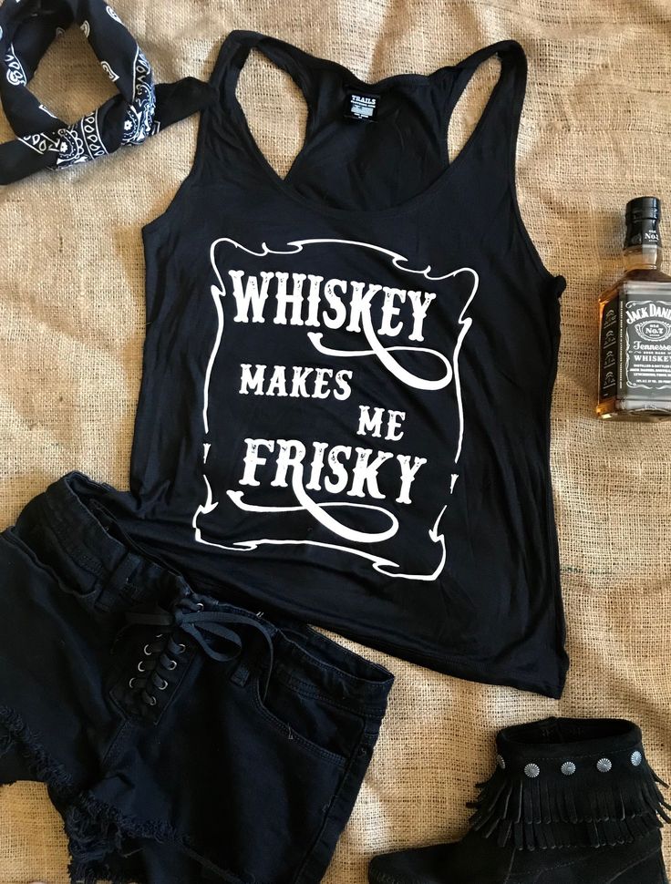 Whiskey Makes Me Frisky's 95% rayon and 5% spandex blend creates a luxuriously soft, lightweight tank top, ideal for layering or just enjoying the summer. Featuring bold screen-printed design on the front and a sleek A-line cut, this top stretches to fit without ever shrinking! Model is 5'10" with measurements of 33" 25" 34", wearing a size small. Size Chart TRUE TO SIZE PREMIUM FABRIC MADE IN THE U.S.A.🇺🇸 Our guarantee to you: If you are not 100% satisfied with your purchase, you can return y Fitted Racerback T-shirt For Summer, Fitted Tank T-shirt For Summer, Trendy Summer Vest With Letter Print, Summer Stretch Vest With Graphic Print, Printed Fitted Cotton Tank Top, Fitted Graphic Print Tank Top With Scoop Neck, Fitted Scoop Neck Tank Top With Graphic Print, Trendy Printed Tank Top, Fitted Letter Print Tank Vest