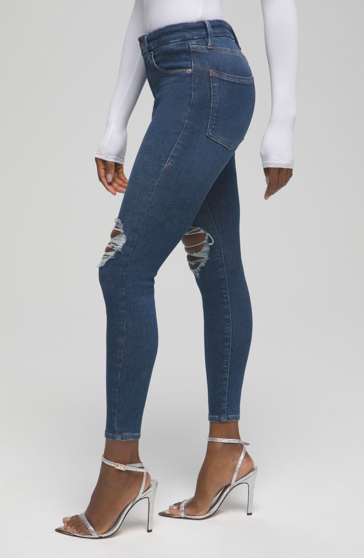 Create the perfect fit every time with these indigo-wash skinnies designed with premium stretch denim that changes with your body up to four different sizes. 28" inseam; 9" leg opening; 9 1/2" front rise; 14" back rise (size 00-4) Zip fly with button closure Five-pocket style 86% cotton, 5% recycled cotton, 5% polyester, 4% Lycra® spandex Machine wash, tumble dry Made in Turkey Women's Clothing Black Owned and Founded Distressed Mid-rise Fitted Jeggings, Distressed High Rise Jeggings, Ripped Mid-rise Jeggings For Fall, High Rise Stretch Distressed Jeggings, Fall Ripped Mid-rise Jeggings, High Rise Ripped Fitted Jeans, Ripped Stretch Cropped Mid-rise Jeans, Mid-rise Stretch Ripped Cropped Jeans, Ripped Stretch Mid-rise Cropped Jeans