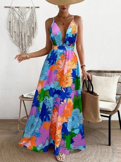 Vibrant Vacation Chic: Flower Printed Spaghetti Straps Backless Dress Floral Print Spaghetti Strap Dresses For Beach Season, Floral Print Sundress For Beach Party Season, Summer Maxi Dress With Spaghetti Straps And Tropical Print, Beach Party Floral Print Sundress For Beach Season, Beach Party Floral Print Sundress, Beach Party Floral Sundress For Beach Season, Floral Print Beachwear Sundress For Summer Parties, Beach Season Halter Neck Floral Sundress, Floral Print Backless Beachwear Dress