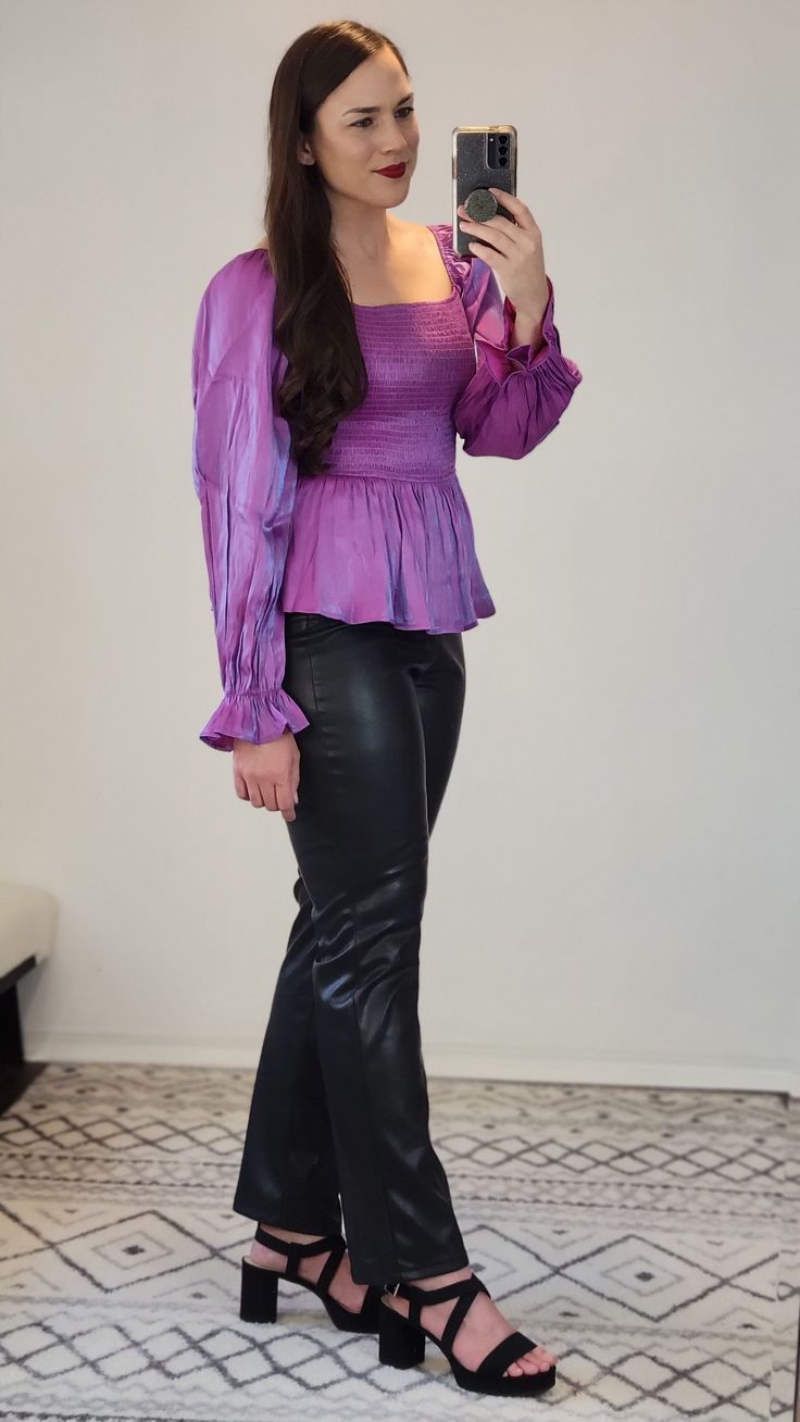 Details: This beautiful chic shimmery metalic top features a smocked bodice with peplum detail, long sleeves, and square neck. The magenta color is gorgeous and the shimmer has hints of blue. Pair it with some black pants and a nice bootie or heels! Sizes Available: -S(2) -M(1) -L(2) Materials: 60% Rayon, 40% Polyester Made In: China Sizing Tip: Order True to Size or you can size up or down if in between. I am about 5'7 165 pounds and a 34B, and I am generally a size S/M top and am wearing a med Magenta Color, Khloe Kardashian, Square Neck, Bootie, Peplum Top, Black Pants, Smocking, Bodice, Blouses