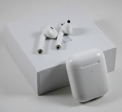 an apple airpods sitting on top of a white box next to another pair of ear buds