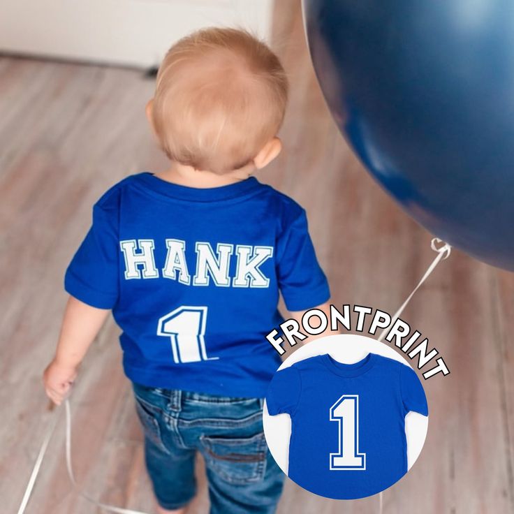 Personalized Birthday Number Shirt 1st Birthday Boy Tee Any Number and Name Kids Birthday Custom Shirt Baby Boy First Birthday Outfit Personalized  1st Birthday shirt with a name and age of your child. Cute for boys 1st birthday party shirt. Can be customized for any age or birthday. Choose a color of a t-shirt, color of the design and make it yours!  Two sides of the t shirt are personalized for your child. ⭐️ 𝐇𝐨𝐰 𝐭𝐨 𝐨𝐫𝐝𝐞𝐫: Please specify : Name: Number: Print Color: Font chart is ava Blue Short Sleeve T-shirt For First Birthday, Blue Family Matching Shirt For Birthday, Blue Pre-shrunk Shirt For Birthday, Family Matching Blue Shirt For Birthday, Blue Crew Neck T-shirt For First Birthday, Customizable Blue T-shirt For First Birthday, Personalized Blue T-shirt For Birthday, Blue Crew Neck Top For First Birthday, Baby Boy First Birthday Outfit