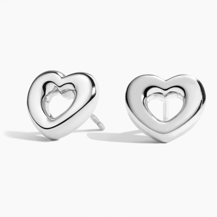 Heart Shaped Tube Stud Ears - Silver. Our favorite heartfelt style. As lightweight as can be, these tube stud earrings are perfect for everyday wear and easily stacked. Brilliant Earth, Jewelry Lookbook, Accessories Jewelry Earrings, Silver Earrings Studs, Silver Heart, Tattoos And Piercings, Bling Bling, Heart Shapes, Piercings