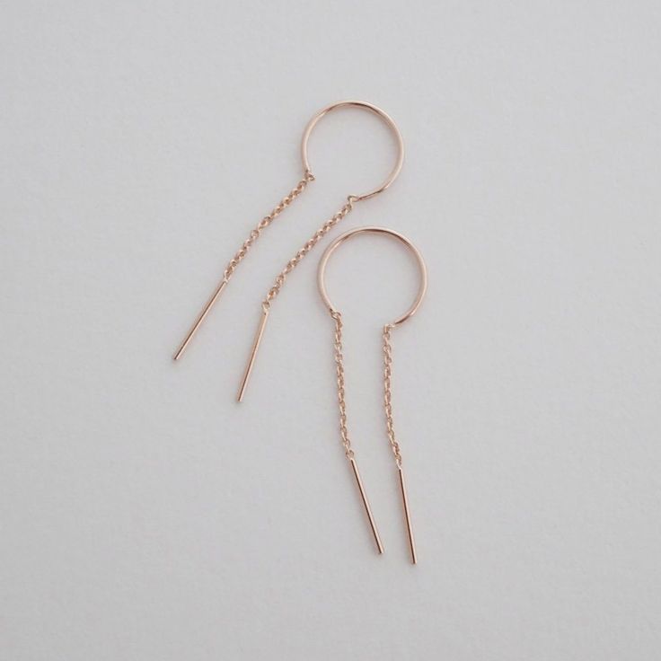 Threader earrings detailed with slim bar at each end. A fun, modern silhouette. Wear these stunners solo or alongside your favorite studs. 2.5" long; chain drop measures 1". Our materials make for an amazing, high quality, seamless, jewelry piece with longevity. Our earrings are plated with 18k gold, 18k rose gold, or rhodium and finished with a protective coating. A little secret we’ll keep between us: it looks way more than it costs. Chime Earrings, All That Glitters Is Gold, Between Us, Threader Earrings, Delicate Jewelry, Bar Earrings, Shoes With Jeans, Handbag Shoes, Rose Gold Earrings