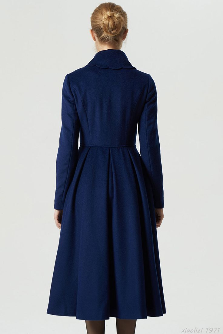 "The blue long coat is the ultimate in luxury women's outerwear and a real statement piece. The princess wool coat features pleating at the front adds structure whilst the cinched in waist and full skirt gives a feminine look. The navy stylish coat can be paired with your existing winter wardrobe easily and you'll find that this winter wool dress coat matches everything you own. DETAIL * 50% wool, 50% fiber, nylon, polyester * Polyester Lining * Lapel collar, Long sleeves * Fitted waist * Two si Blue Double-breasted Peacoat With Notch Lapel, Blue Peacoat With Notch Lapel And Button Closure, Blue Double-breasted Pea Coat With Notch Lapel, Blue Double-breasted Notch Lapel Pea Coat, Blue Notch Lapel Pea Coat With Double-breasted Buttons, Blue Double-breasted Long Sleeve Pea Coat, Elegant Blue Peacoat With Lapel Collar, Blue Double-breasted Long Sleeve Peacoat, Blue Long Sleeve Double-breasted Peacoat