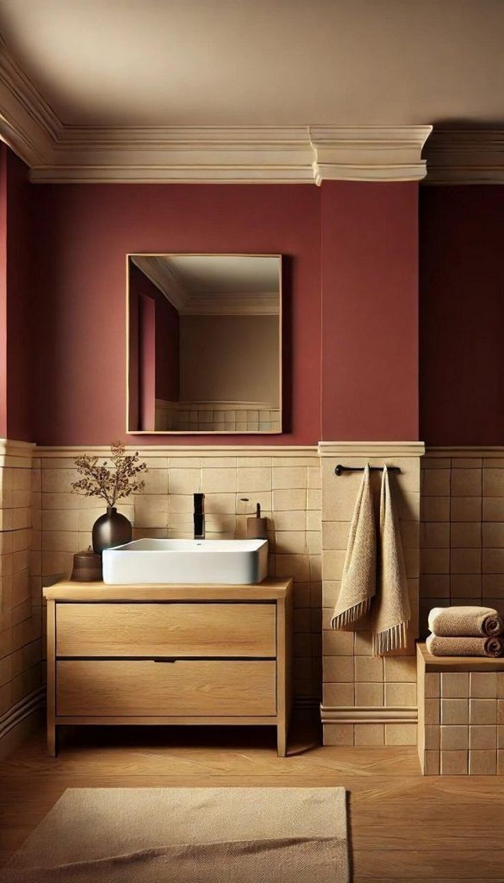 a bathroom with a sink, mirror and towel rack in it's center area