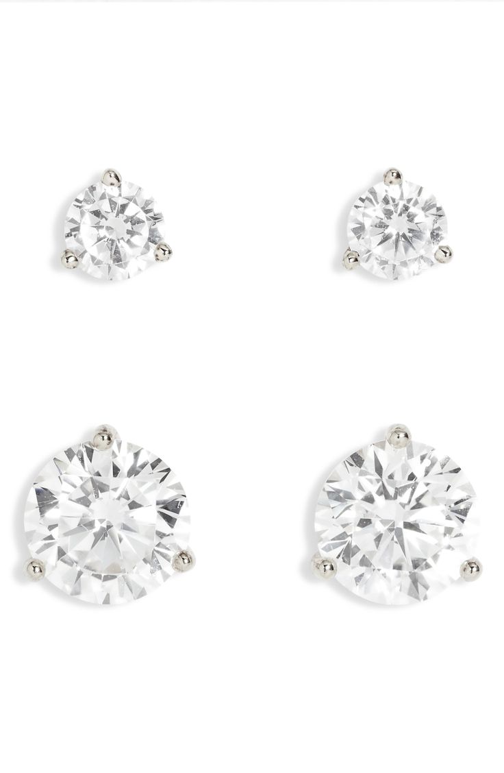 Round-cut cubic zirconia stones in three-prong settings bring plenty of sparkle to these everyday studs perfect for wearing solo or adding to your curated ear. Set of two pairs of earrings 1/8" diameter; 1/4" diameter Post back Sterling silver/14k-gold plate or platinum plate/cubic zirconia Imported Item ships in a gift box Curated Ear, Sheath Gown, Mac Duggal, Gold Details, Prong Setting, Round Cut, Gift Set, Cubic Zirconia, Platinum