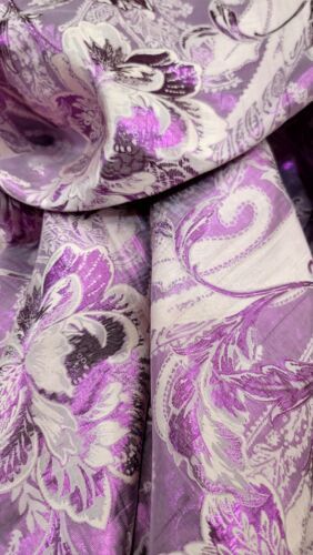 a purple and white floral print fabric