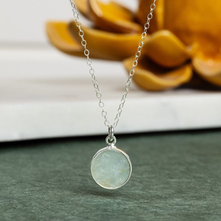 Handmade Gemstone Necklace - Aquamarine 925 Sterling Silver Round Disc Pendant Dainty Cable Chain - Jewelry Gifts for Mom, wife, sister, bff Stone: Genuine Aquamarine Please note due to nature of our genuine stones no two are alike and the ones you will receive will vary slightly from the ones pictured in the photos. Bezel: 925 Sterling Silver. Bezel only goes around the gemstone. Both back and front show the stone. Chain: 925 Sterling Silver, 16 to 8 inch adjustable, 1.3mm cable, Spring Ring Cl Silver Round Necklace With Birthstone, Sterling Silver Necklaces With Natural Stones For Anniversary, Natural Stones Round Necklace For Her, Silver Moonstone Charm Necklace As Gift, Silver Moonstone Charm Necklace For Gift, Natural Stones Necklace Gift For Her, Moonstone Round Pendant Jewelry For Gift, Natural Stones Necklace For Her, Natural Stone Necklaces As Gift For Her