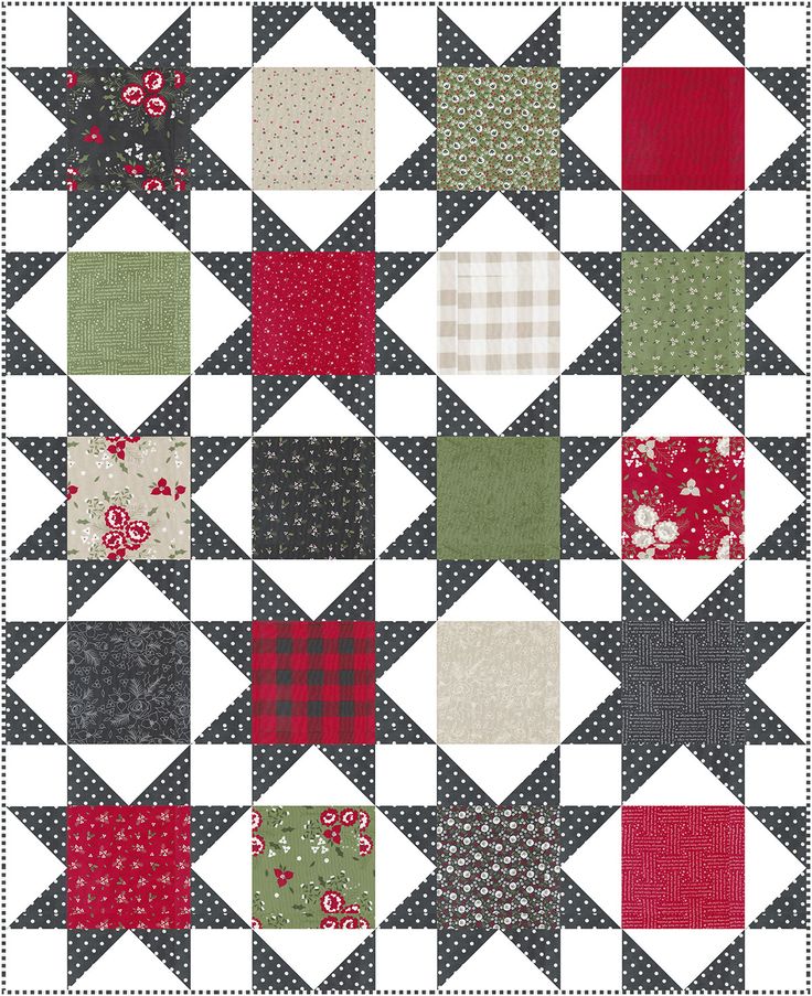 a patchwork quilt with red, green and white squares on it's sides