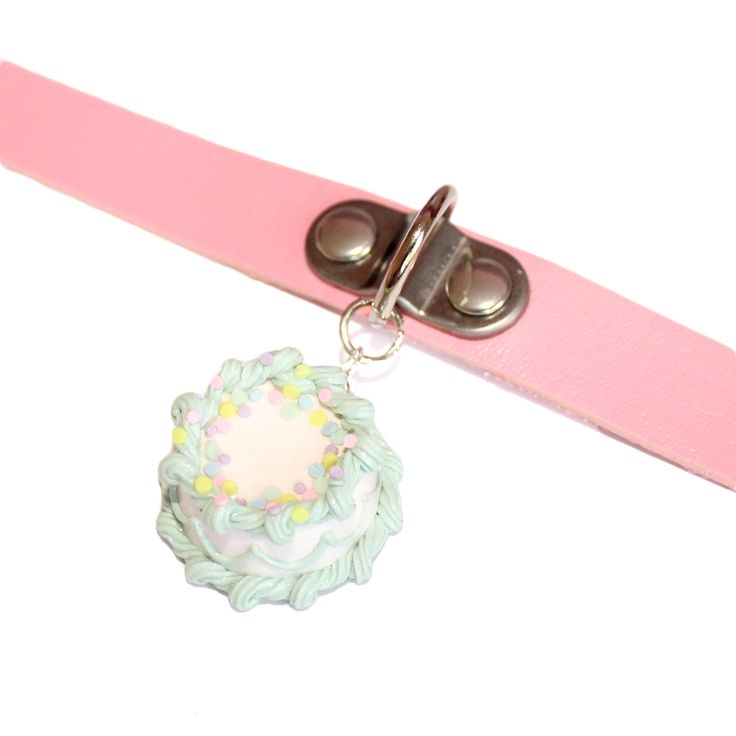 "This kawaii necklace features a gorgeous mint and pastel birthday cake pendant hand sculpted by me from polymer clay. Comes on a pink vegan leather choker adjustable from 12-16\". Closes with snap buttons. Choker width: approx 1/2\". Cake pendant is about 1\" wide. Each will be unique due to their handmade nature.  Want this on a chain? It's available in my shop! http://etsy.com/shop/fatallyfeminine **Made to Order- Please allow 2 weeks from time of purchase until item ships** Every order comes with free gift packaging! Please contact me with any questions you may have and thanks for shopping FFD!" Baby Cakes Kawaii Cottage Core Necklaces, Polymer Clay Kawaii Necklaces, Pastel Birthday Cake, Mint Green Birthday, Choker 90s, Green Birthday Cakes, Pink Birthday Cake, 90s Choker, Mint Cake