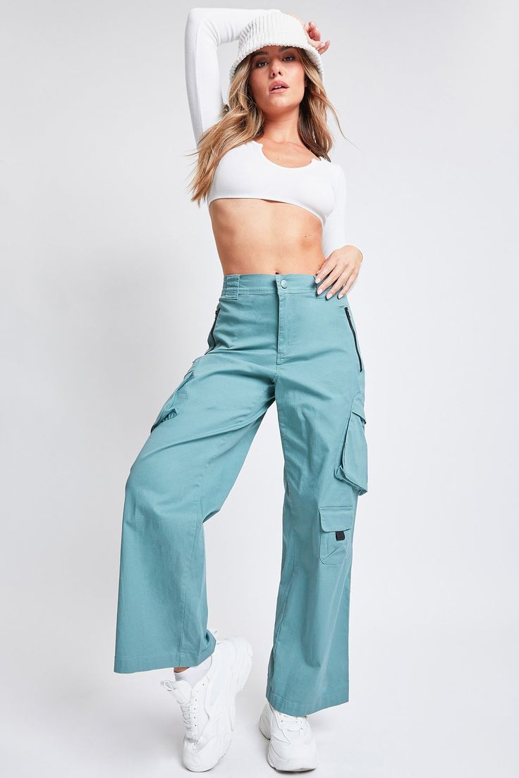 Experience the perfect fusion of style and practicality in these Women’s High-Rise Relaxed Fit All Day Cargo Pants. Stay organized and prepared with expandable side flap utility pockets, perfect for storing your essentials on the go. An additional utility flap pocket on the right side with a contrasting pull tab further enhances both style and storage. The zip fly closure with snap button and rear elastic waistband ensures a comfortable fit, allowing for easy movement while maintaining a sleek s Green Wide-leg Cargo Pants With Patch Pockets, Utility Wide-leg Pants With Multiple Pockets, Utility Wide-leg Cargo Pants With Hip Pockets, Functional Straight Leg Pants With Cargo Pockets, Utility Pants With Functional Pockets, Full Length, Functional Cargo Style Straight Leg Bottoms, Versatile Wide-leg Cargo Pants With Pockets, Utility Full Length Pants With Functional Pockets, Utility Style Full Length Pants With Functional Pockets