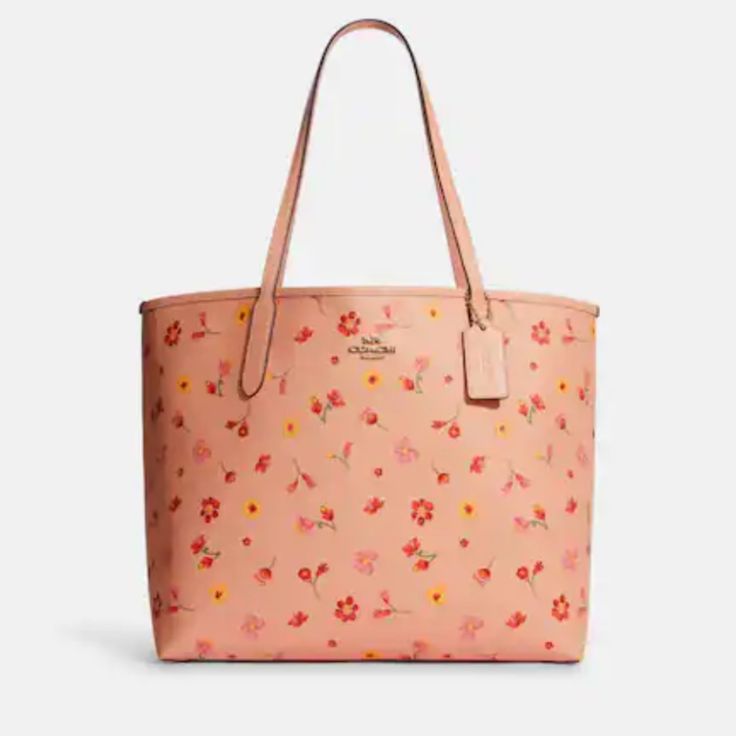 Printed Coated Canvas And Smooth Leather Inside Zip Pocket Snap Closure Handles With 10" Drop 13" (L) X 11 1/2" (H) X 6 1/4" (W) Luxury Pink Bags With Floral Print, Luxury Pink Floral Print Bags, Elegant Coach Bags With Floral Print, Pink Floral Print Leather Bag, Feminine Coach Bags For Everyday Use, Coach Floral Print Bags For Everyday Use, Elegant Red Bags With Floral Print, Elegant Floral Print Tote Bag, Elegant Red Floral Print Bags