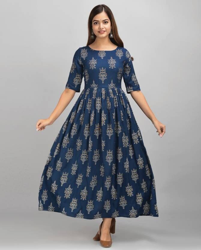 Ideal for: Women Length Type: Ankle Length Brand Color: Blue, Grey Occasion: Casual Pattern: Printed Type: Ethnic Dress Fabric: Viscose Rayon Style: Flared rayon kurta with desiger tussels at back Neck: Round Neck Sleeve: Half Sleeve Color: Gold, Blue Fabric Care: Regular Machine Wash, Hand wash Package contains: 1 kurta Good quality kurta for you ..its give comfort and classy look. Eid Ikat Print Dress, Bollywood Style Blue Floral Print Dress, Bollywood Blue Floral Print Dress, Blue Bollywood Dress With Floral Print, Festive Blue Batik Print Kurta, Traditional Long Blue Dress, Traditional Printed Floor-length Maxi Dress, Traditional Ankle-length Dresses With Printed Motifs, Bohemian Maxi Dress For Diwali