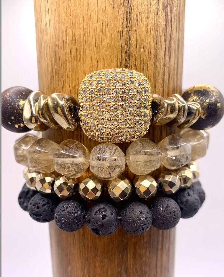 Beautiful Wooden Beads with Gold Accents Irregular Pyrite With Square Cz Bead. Lemon Quartz Bracelet Round faceted Gold Hematite Bead Round Black Lava Rock Bead Luxury Beaded Bracelets With Faceted Beads, Luxury Faceted Beaded Bracelets, Luxury Adjustable Bracelet With Faceted Beads, Luxury Adjustable Bracelets With Faceted Beads, Gold Beaded Rondelle Crystal Bracelet, Gold Beaded Bracelets With Stones, Spiritual Rondelle Faceted Beaded Bracelets, Adjustable Beaded Bracelets With Round Stones, Gold Beaded Bracelets With Natural Stones