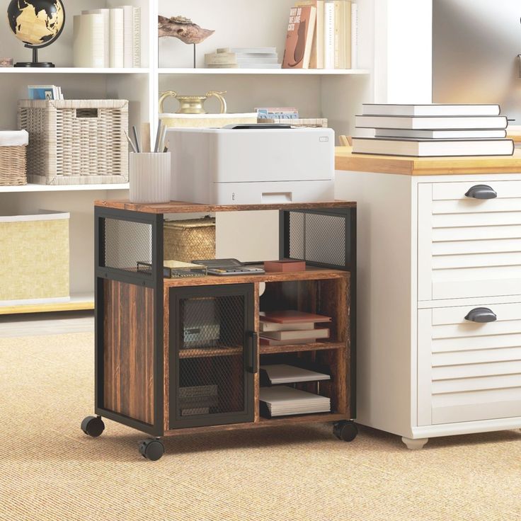 a room with a desk, bookshelf and other items on the floor in front of it