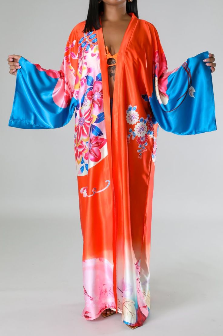 Long kimono cardigan Long sleeves Satin No closure 100% polyester Hand wash cold One size Belt not included. MODEL STATS Height: 5.3"Bust:33" / Waist:28" / Hips:42" Red Spring Cardigan For Vacation, Red Spring Vacation Cardigan, Oversized Open Front Spring Robe, Spring Long Sleeve Fitted Kimono, Long Sleeve Orange Kimono For Spring, Spring Fitted Long Sleeve Kimono, Orange Long Sleeve Kimono For Festivals, Fitted Long Sleeve Spring Kimono, Long Orange Spring Outerwear