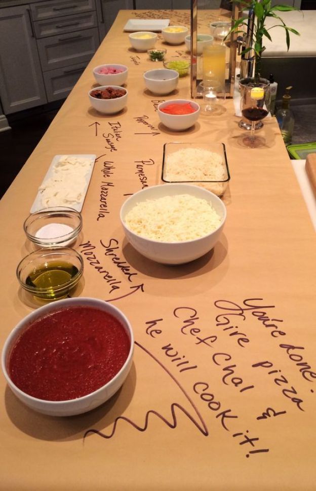 the table is set up with different foods and condiments on it, including rice