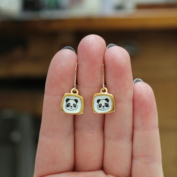 Tiny Gold Panda Earrings - Gold Dipped Sterling Silver Panda Earrings – Mark Poulin Jewelry Everyday Handmade Enamel Jewelry, Nickel Free White Gold Plated Earrings, Yellow Gold Enamel Dangle Earrings, Personalized Enamel Jewelry For Everyday, White Gold Plated Nickel-free Earrings, White Gold Plated Nickel Free Earrings, Everyday Personalized Enamel Jewelry, Enamel Drop Earrings As A Gift, Enamel Drop Earrings For Gifts