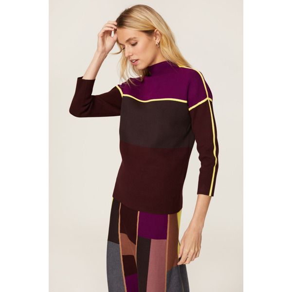 Purple color block knit (72% Viscose, 28% Nylon). Sweater. Mock neck. Long sleeves. Pull-on. 23" from shoulder to hemline. Imported. Fall Color Block Turtleneck Tops, Stretch Multicolor Color Block Sweater, Chic Color Block Sweater For Layering, Retro Contrast Color Tops For Fall, Color Block Tops For Workwear In Winter, Color Block Tops For Winter Workwear, Fitted Color Block Sweater For Fall, Color Block Fitted Sweater For Fall, Fitted Patchwork Sweater For Layering