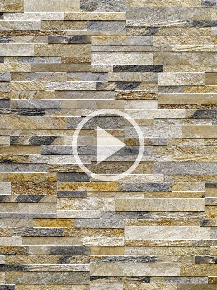 a wall made out of different types of wood and stone tiles with an arrow pointing to the