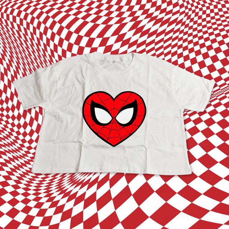 Elevate your style with our cotton crop top featuring a unique Spider Heart Logo inspired by Gwen. Perfect for fans of the Spider-Verse, this trendy top combines comfort with a touch of superhero flair, making it an ideal gift for any Gwen Stacy enthusiast. I send you proof before printing it. If you want Photo & Logo printing, please send it through ETSY messages M A T E R I A L S → 4 oz./yd², 60/40 combed ringspun cotton/polyester, 30 singles → Retail fit → Set-in 1x1 baby rib collar and cuffs Red Cropped Cotton T-shirt With Graphic Print, Red Cotton Cropped T-shirt With Graphic Print, White Y2k Tops For Halloween, White Y2k Style Top For Halloween, White Tops With Pop Culture Character Print, White Pop Culture Tops With Cartoon Print, Casual Halloween Graphic Print Crop Top, White Pop Culture Tops With Character Print, Fun White Top With Heart Graphic