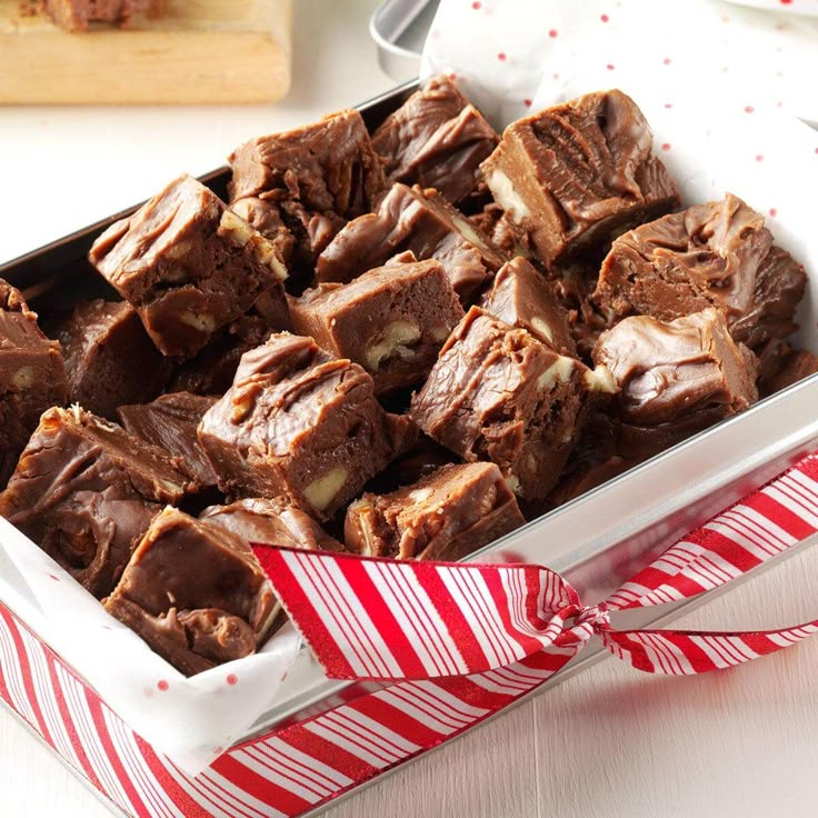 a box filled with brownies sitting on top of a table