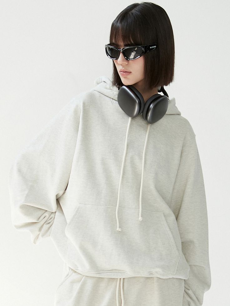 Editor's NoteThis product, with its minimalist yet fashionable design, is a testament to modern streetwear aesthetics. The oversized fit and drop shoulder styling ensures both comfort and a chic silhouette. Its kangaroo pocket and adjustable drawstring hood provide functionality while upholding the contemporary feel.- This hoodie stands out for its clean and stylish design, perfectly blending form and function.- Wearers will appreciate the comfortable and modern appeal lent by the loose-fitting Spring Hoodie With Pockets Relaxed Fit, Spring Hoodie With Pockets In Relaxed Fit, Modern Hoodie Sweatshirt With Ribbed Cuffs, Modern Streetwear Hoodie With Ribbed Cuffs, Relaxed Fit Solid Sweatshirt With Kangaroo Pocket, Trendy Sweatshirt With Kangaroo Pocket, Relaxed Fit Sweatshirt With Kangaroo Pocket And Drop Shoulder, Trendy Everyday Sweatshirt With Kangaroo Pocket, Relaxed Fit Sweatshirt With Kangaroo Pocket For Streetwear